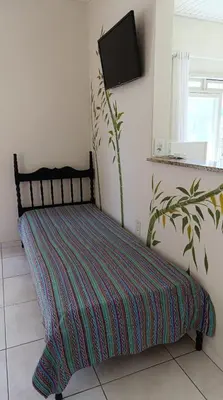 Uma cama ou camas num quarto em Casa ZEN Bombinhas - 120m do Mar