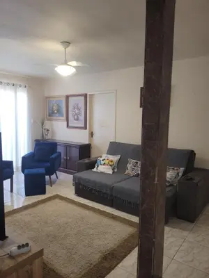 Uma área de estar em Casa com 3 Quartos Enseada Encantada