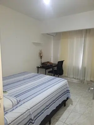 Uma cama ou camas num quarto em Casa com 3 Quartos Enseada Encantada