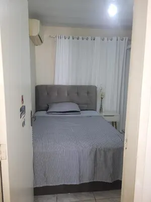Uma cama ou camas num quarto em Casa com 3 Quartos Enseada Encantada