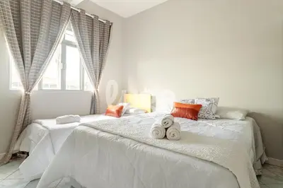 Uma cama ou camas num quarto em LUGA Casa Aconchegante a 800m da Praia de Palmas