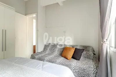 Uma cama ou camas num quarto em LUGA Casa Aconchegante a 800m da Praia de Palmas