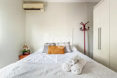 Uma cama ou camas num quarto em LUGA Casa Aconchegante a 800m da Praia de Palmas