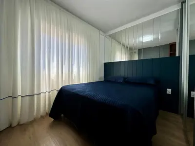 Uma cama ou camas num quarto em Cobertura finamente mobiliada com jacuzzi