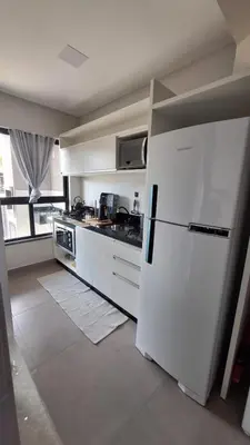 A cozinha ou kitchenette de Residencial da Vila Apto 2