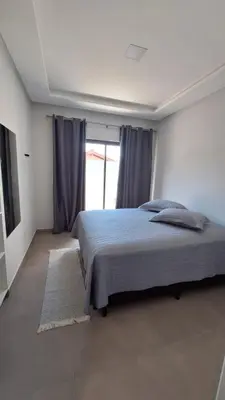 Uma cama ou camas num quarto em Residencial da Vila Apto 2