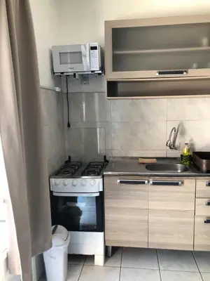 A cozinha ou kitchenette de Kitnet centro de bombinhas