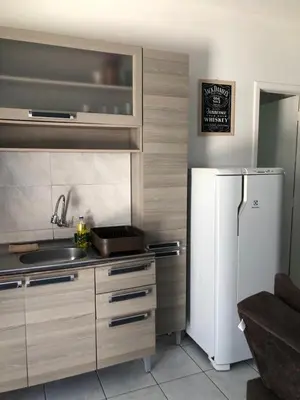 A cozinha ou kitchenette de Kitnet centro de bombinhas