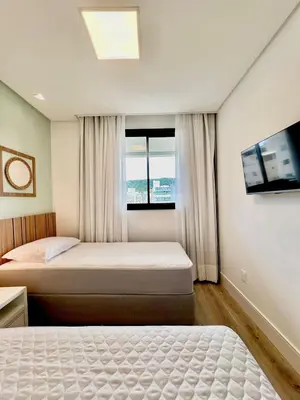 Uma cama ou camas num quarto em Lumina - Luxuoso apartamento