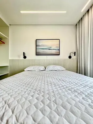 Uma cama ou camas num quarto em Lumina - Luxuoso apartamento