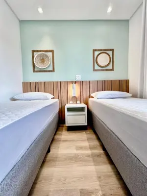 Uma cama ou camas num quarto em Lumina - Luxuoso apartamento