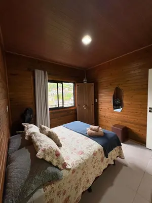 Uma cama ou camas num quarto em Cobertura Vista mar com churrasqueira