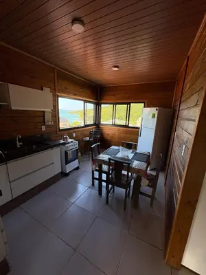 A cozinha ou kitchenette de Cobertura Vista mar com churrasqueira