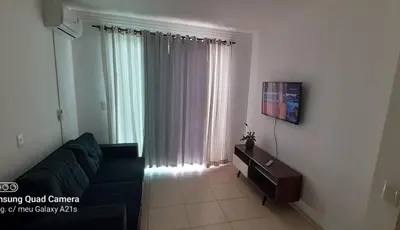 Uma televisão e/ou sistema de entretenimento em Aluguel temporada Itapema