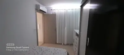 Uma cama ou camas num quarto em Aluguel temporada Itapema