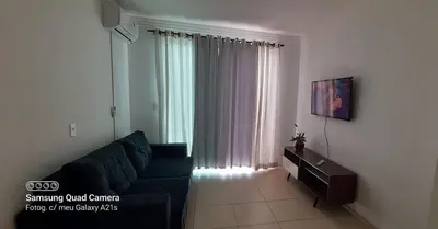 Uma televisão e/ou sistema de entretenimento em Aluguel temporada Itapema