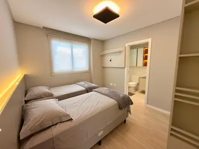 Uma cama ou camas num quarto em Frente Mar Panoramico 2 Suites Gourmet 2 vgs