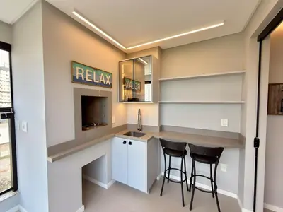 A cozinha ou kitchenette de Frente Mar Panoramico 2 Suites Gourmet 2 vgs