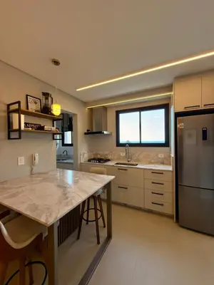 A cozinha ou kitchenette de Frente Mar Panoramico 2 Suites Gourmet 2 vgs