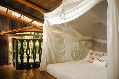 Uma cama ou camas num quarto em Cabana na Mata • Privacidade • Mariscal