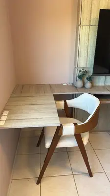 Uma televisão e/ou sistema de entretenimento em Apartamento na Praia de Palmas com vista para o mar, 250m da areia
