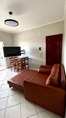 Uma área de estar em Apartamento na Praia de Palmas com vista para o mar, 250m da areia