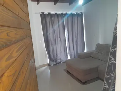Uma área de estar em Casa Mariscal