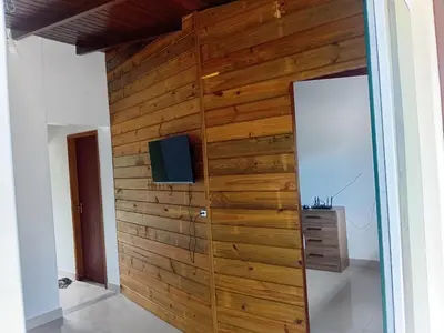 Uma televisão e/ou sistema de entretenimento em Casa Mariscal