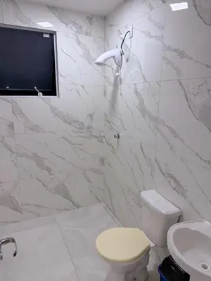 Uma casa de banho em Recanto perto do mar com Jacuzzi
