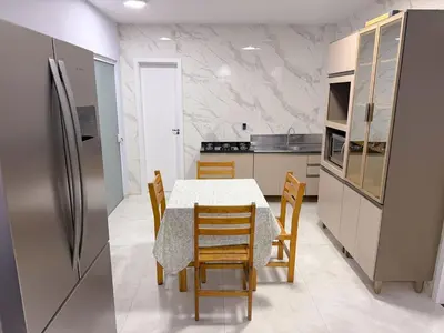 A cozinha ou kitchenette de Recanto perto do mar com Jacuzzi