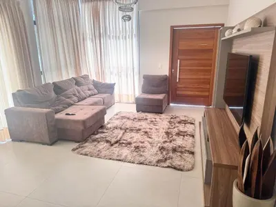 Uma área de estar em Casa Praia 6 quartos Zimbros-Bombinhas