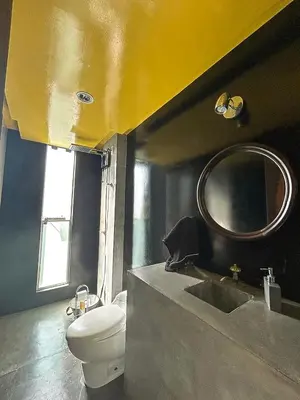 Uma casa de banho em Casa nas Nuvens com incrível vista mar