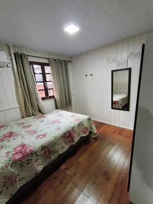 Uma cama ou camas num quarto em Casa Beira Mar