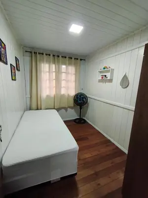 Uma cama ou camas num quarto em Casa Beira Mar