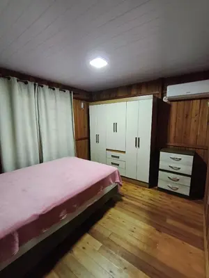 Uma cama ou camas num quarto em Casa Beira Mar