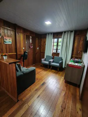 Uma área de estar em Casa Beira Mar