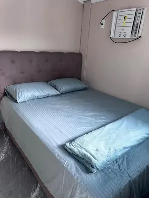 Uma cama ou camas num quarto em Casa em Bombinhas Temporada