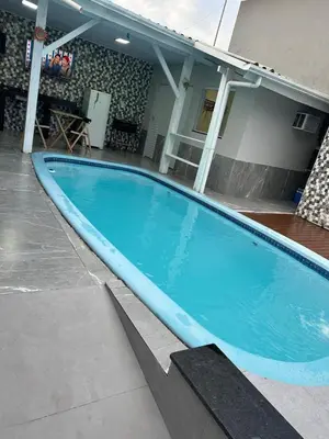 A piscina em ou perto de Casa em Bombinhas Temporada