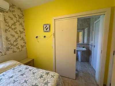 Uma cama ou camas num quarto em Casa Alameda das Laranjeiras