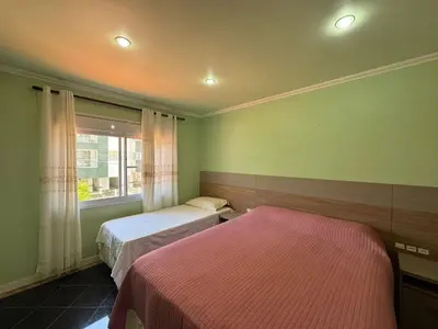 Uma cama ou camas num quarto em Casa Alameda das Laranjeiras