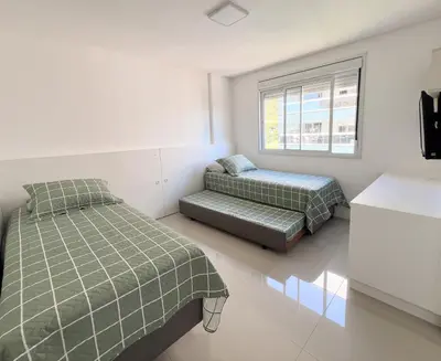 Uma cama ou camas num quarto em Boulevard - Praia de Palmas
