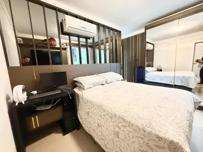 Uma cama ou camas num quarto em Seu refúgio em Bombinhas, conforto e pé na areia