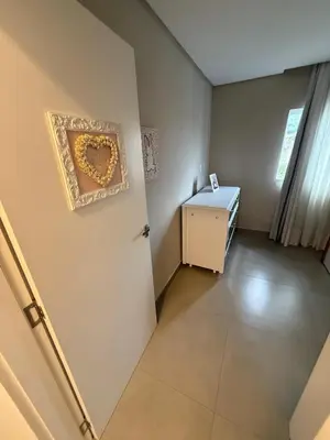 Uma cama ou camas num quarto em Duplex de veraneio , Temporada