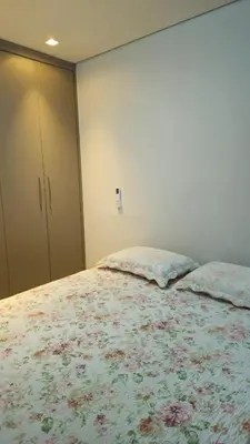 Uma cama ou camas num quarto em Novo apartamento em Itapema - 02 suites