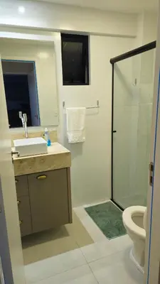 Uma casa de banho em Novo apartamento em Itapema - 02 suites