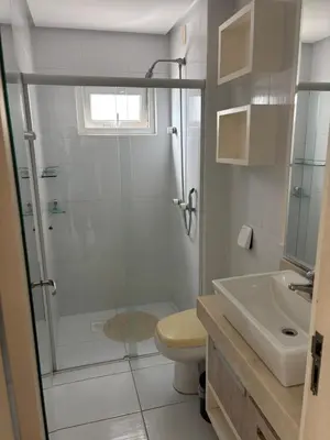 Uma casa de banho em Vista para o molhe