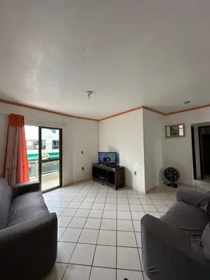 Uma área de estar em Apartamento 30m da Praia de Bombinhas