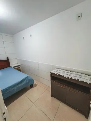 Uma cama ou camas num quarto em Apto 03 canto grande