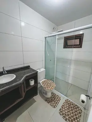 Uma casa de banho em Apto 03 canto grande