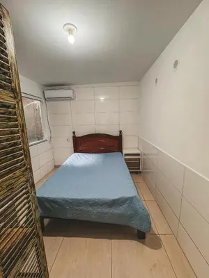 Uma cama ou camas num quarto em Apto 03 canto grande